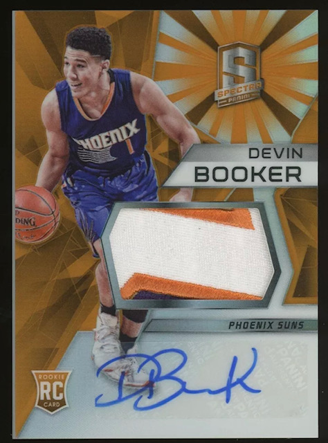 Photo of 2015-16 Devin Booker Panini Spectra Orange Prizm Rookie Card